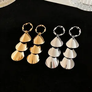 Elegant layered metallic petal drop earrings in gold and silver finishes