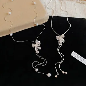 Elegant French style sparkling crystal bow-knot Y-shaped necklace with white pearls