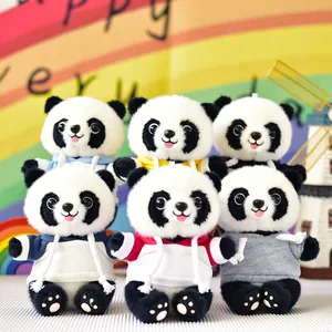 Collection of six plush panda dolls wearing colorful hoodies in a vibrant rainbow setting