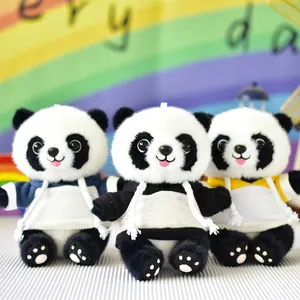 Three adorable panda plush toys wearing colorful hoodies on rainbow background