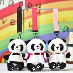 Three adorable panda plush doll keychains wearing colorful hoodies, detail view.