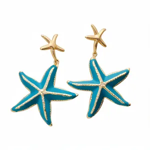 Elegant teal enamel starfish drop earrings with gold finish and sparkling accents for vacation