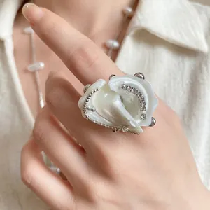Elegant white seashell ring with pearl beads and crystals for beach resort style
