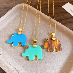 Bohemian resin elephant pendant necklaces in blue green and amber with gold chain