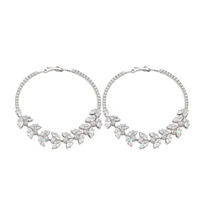 Elegant silver hoop earrings featuring zircon wheat ear design on white background