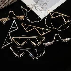 Macro view of W-shaped decorative eyewear frames with sparkling rhinestones and fringe