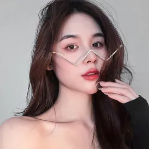 Macro view of fashion model wearing W-shaped rhinestone decorative eyeglass frame