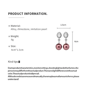 Product dimensions and material details for oval rhinestone and pearl drop earrings