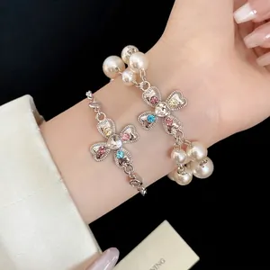 Elegant vintage court style pearl bracelet with crystal floral cross heart pendant charms