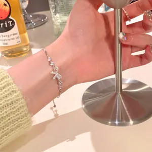 Elegant silver bow knot bracelet with zircon stones, French style adjustable jewelry.