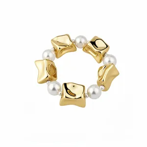 Vintage style ring with gold chunky beads and white pearls in baroque design