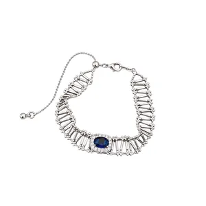 Bracciale vintage traforato in argento con zircone blu ovale e catena regolabile