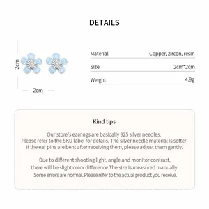 Detailed product specification card showing dimensions and materials for floral stud earrings