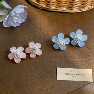 Sweet resin flower stud earrings with sparkling zircon centers in pink and blue