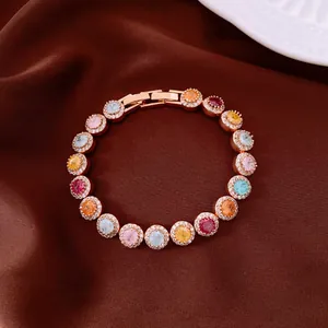 Detailed view of luxury gold-plated bracelet featuring colorful circular zircon stones.