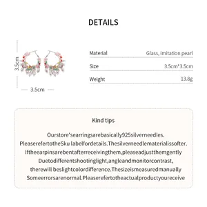 Detail view of colorful beaded hoop earrings with size chart and material specifications