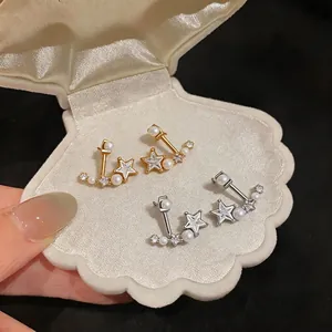 Eleganti orecchini a stella e perla in finiture oro e argento per gioielli da donna