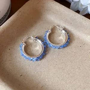 Elegant blue faceted glass bead hoop earrings featuring a minimalist Korean fashion design.