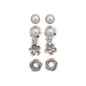 Elegant silver metal earring set featuring vintage floral and faux pearl designs