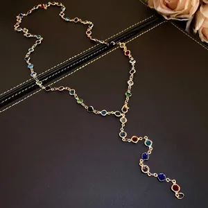 Vintage colorful beaded necklace with acrylic stones and a gold-tone chain accessory