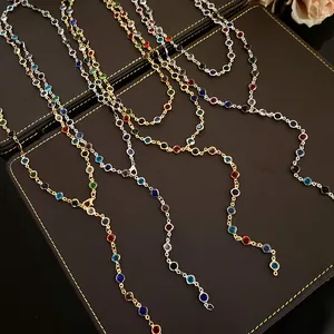 Close-up view of elegant vintage style colorful crystal beaded necklaces on jewelry display box