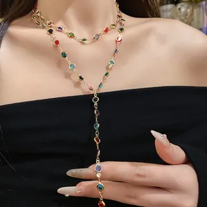 Close-up of double-layered necklace with vibrant colorful beads in vintage gold finish