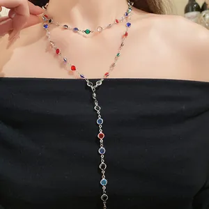Detailed view of a vintage double-layer necklace with vibrant colorful glass beads.