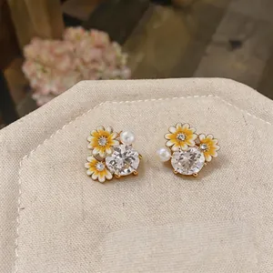Elegant daisy flower stud earrings with zircons and pearls, Korean style jewelry for women.