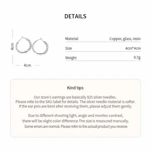 Detailed view of glass beaded hoop earrings with material, size, and weight specifications.