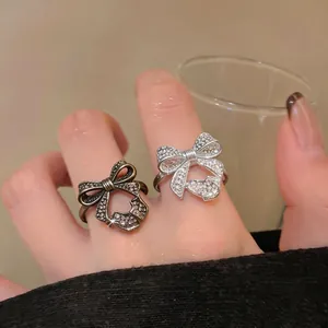 European Light Luxury Bow Hollow Open Ring Design Sense Exquisite Rhinestone Adjustable Finger Ring For Women Banquet Accessory
