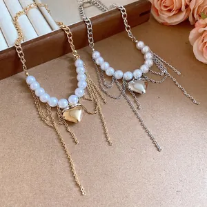Elegant pearl bead chain necklace with a heart pendant in gold and silver finish