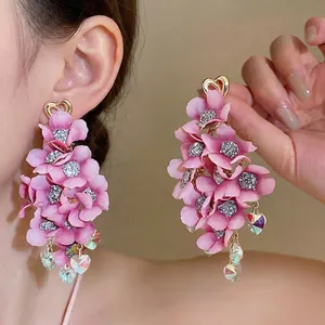 Elegant pink fabric flower drop earrings with crystal heart charms in vacation style.