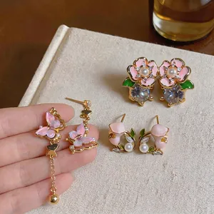Boucles d'Oreilles Douces Papillon Asymétriques Gland Fleur Avec Zirconia Perle Artificielle Tige En Argent Bijoux En Cuivre Femme Rose Or Style Haut De Gamme