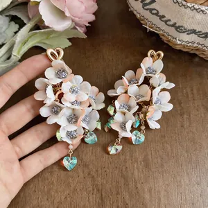 Elegant fabric flower tassel earrings with crystal heart charms for women