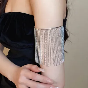 Stylish silver metal arm cuff bracelet featuring long fringe chain tassels for women