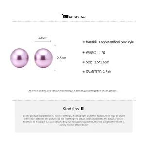 Detail view of purple pearl stud earrings with size, weight and material specifications.