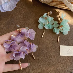 Elegant long floral petal earrings in purple and mint green French style summer jewelry