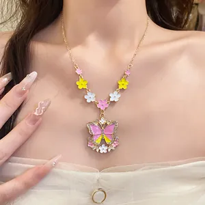 Detailed view of colorful butterfly and flower pendant necklace with rhinestone accents