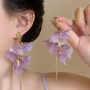Elegant long tassel earrings featuring purple translucent petals for a romantic summer look