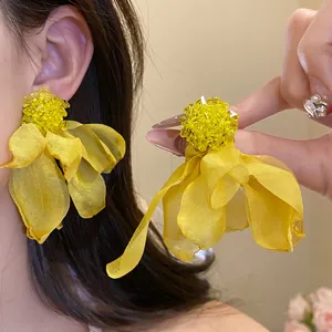Elegant yellow chiffon flower tassel earrings with silver needle studs for women.