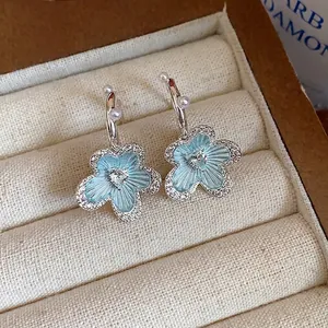Elegant light blue enamel flower earrings with sparkling zircon heart and pearls