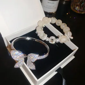 Luxury sparkly zircon butterfly bangle and white beaded bracelet set in a gift box