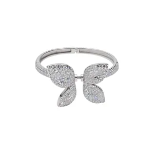 Elegant silver butterfly bangle fully pavé set with sparkling cubic zirconia stones.