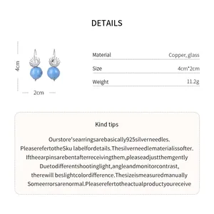 Detailed view of elegant blue glass drop earrings including material and size specifications.