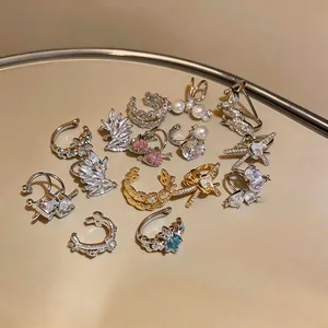Variety of elegant zircon and pearl ear cuffs for non-pierced ears in Korean style.