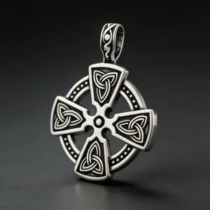 Detail view of vintage Viking Celtic cross pendant with intricate Trinity knot patterns
