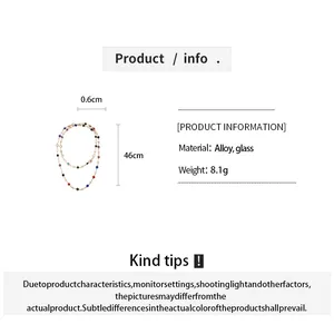 Detail view of colorful crystal geometric necklace with size info and material specs.