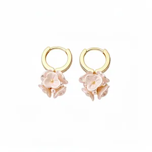 Elegant French style gold hoop earrings with delicate pink flower charms and pearls.