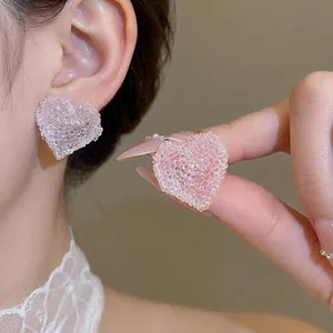 Elegant Korean style pink resin heart stud earrings with frosted crushed ice texture.