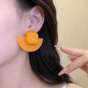 Elegant orange resin earrings featuring a square stud and fan-shaped base for women